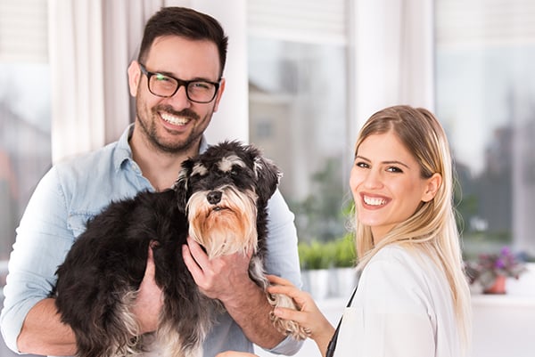 Veterinarian and dog owner