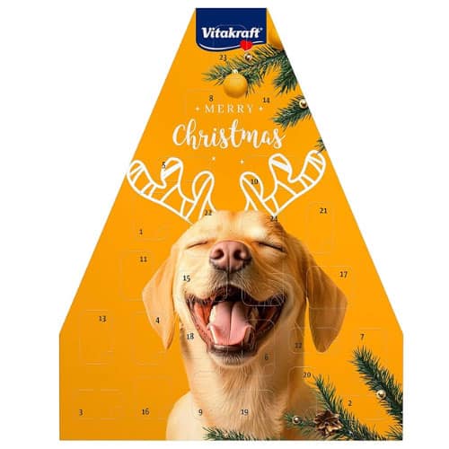 Gelber Adventskalender für Hunde von Vitakraft mit Labrador, hinter dessen Kopf ein gezeichnetes Rentiergeweih zu sehen ist.